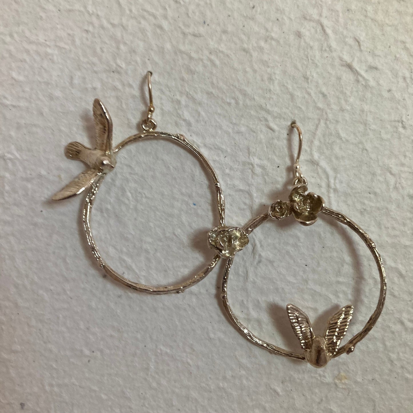 Asymmetric bird, flower, and twig sterling earrings