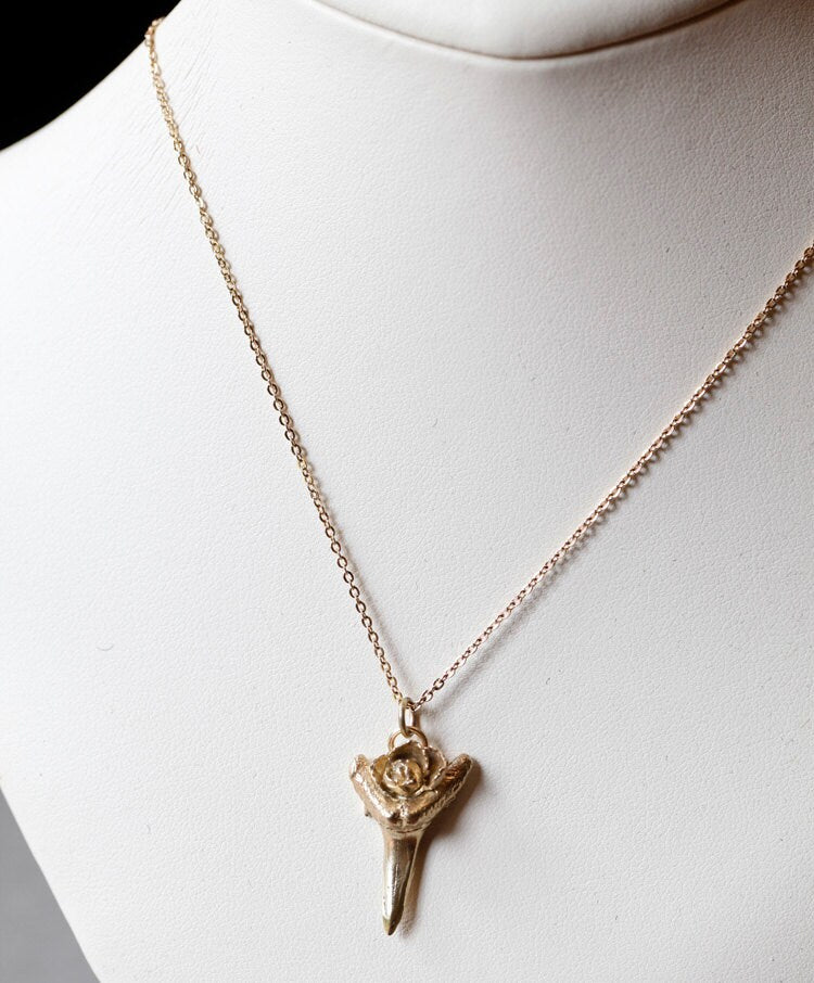 Brass shark tooth with rose