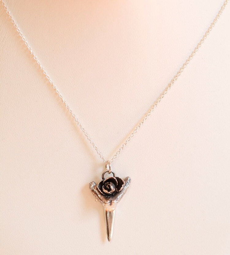 Small silver shark tooth with rose pendant