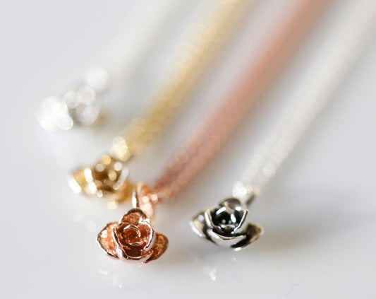 Tiny flower pendant, 14k gold