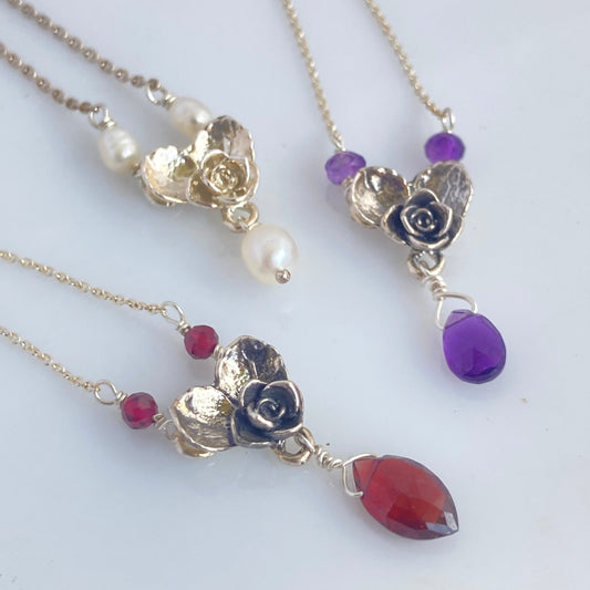 Leaf and rose heart pendant with gem drop
