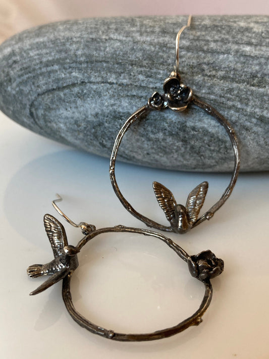 Asymmetric bird, flower, and twig sterling earrings