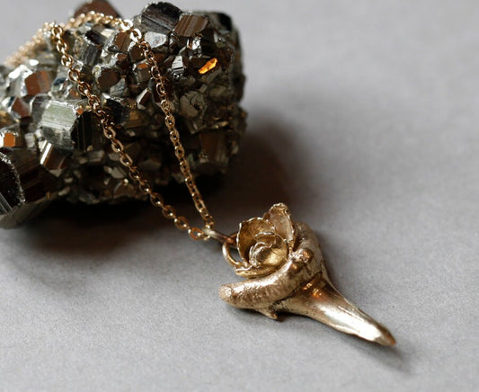 Brass shark tooth with rose